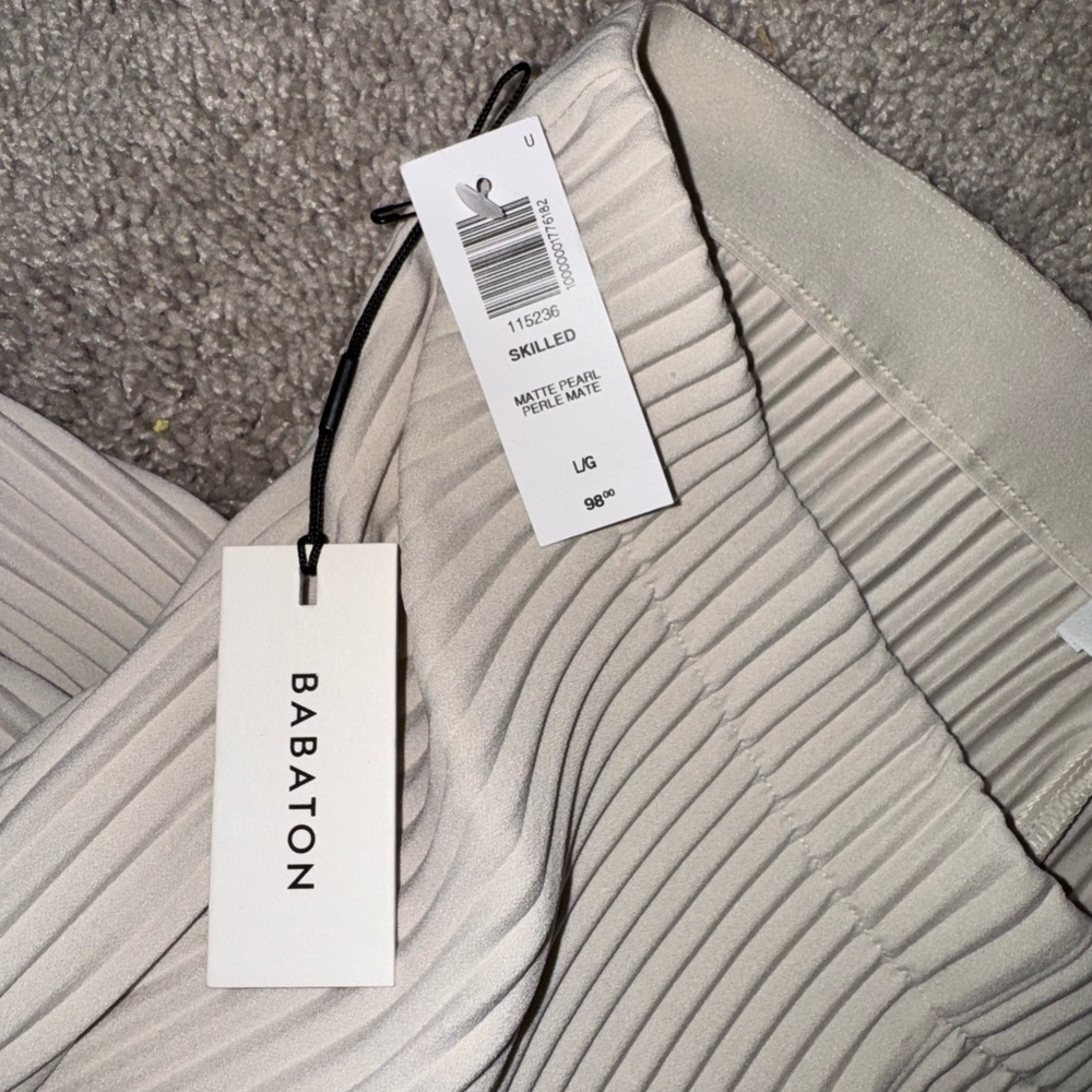 Aritzia Babaton Skilled Pant High-rise plissé wide-leg trousers in Matte Pearl